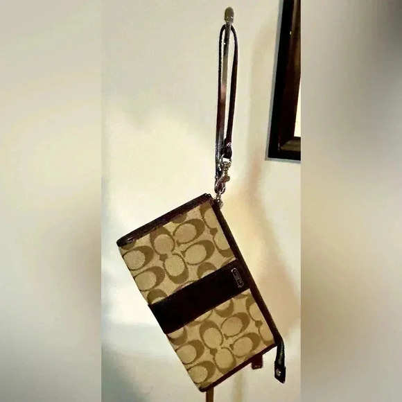 Coach Handbags - Gently Used COACH Signature Brown Cloth/Leather Wristlet